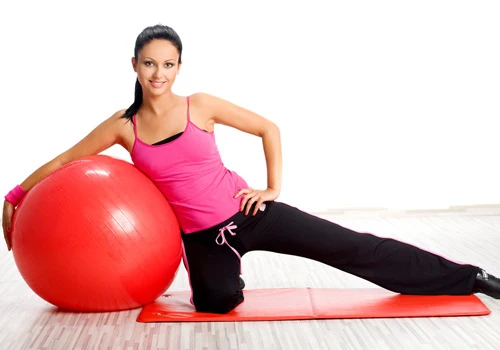 Spinal Decompression Boardman OH Chiropractic Woman Exercise Ball